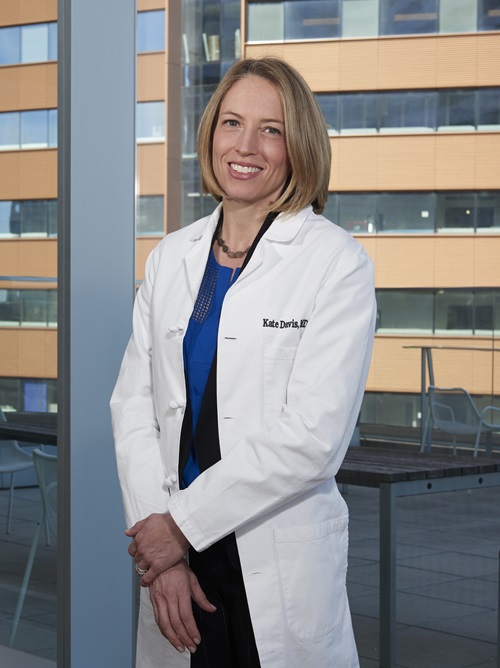 Kathryn Adamiak Davis in a lab coat